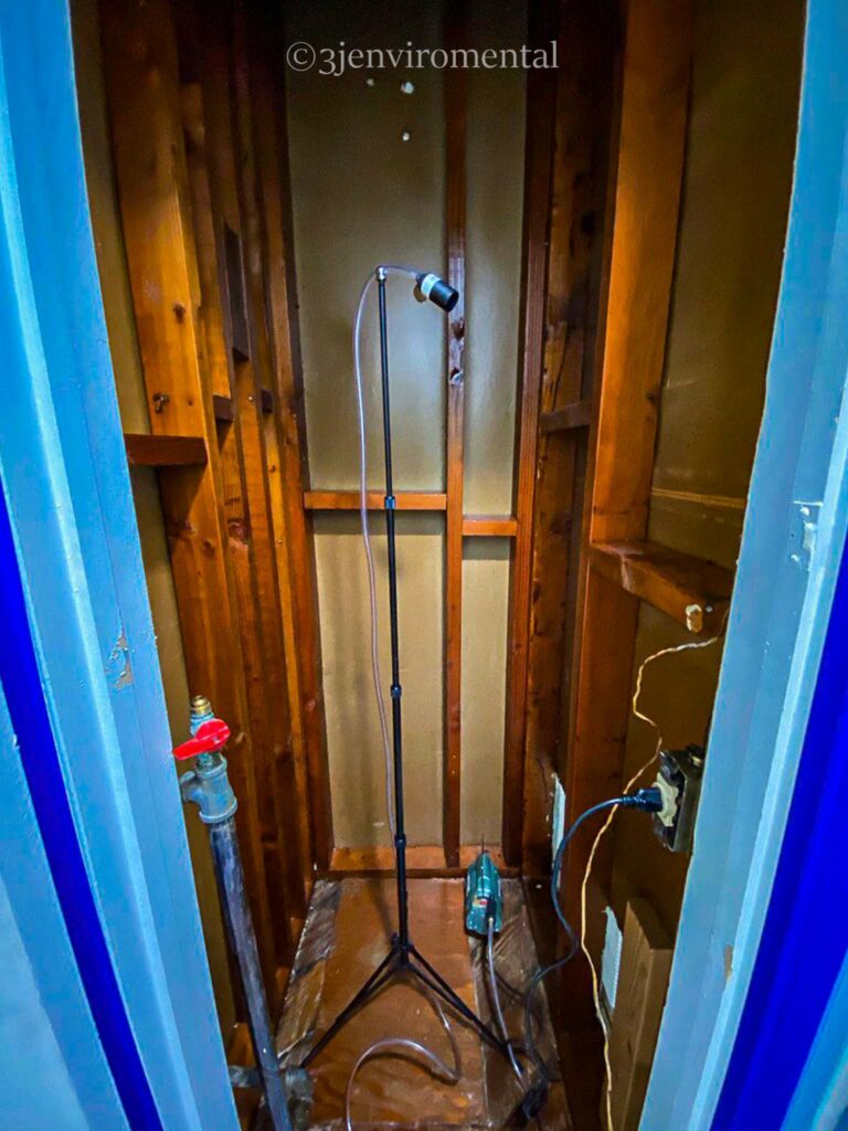 A certified asbestos technician conducts final air clearance testing to confirm that indoor air is safe and free of asbestos fibers after an abatement project in Los Angeles